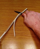 OneCup OneLife - Cutting the plastic around the wires with a knife 3.jpg